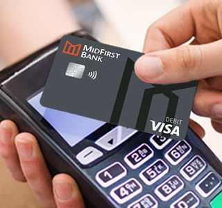 a person holding a credit card