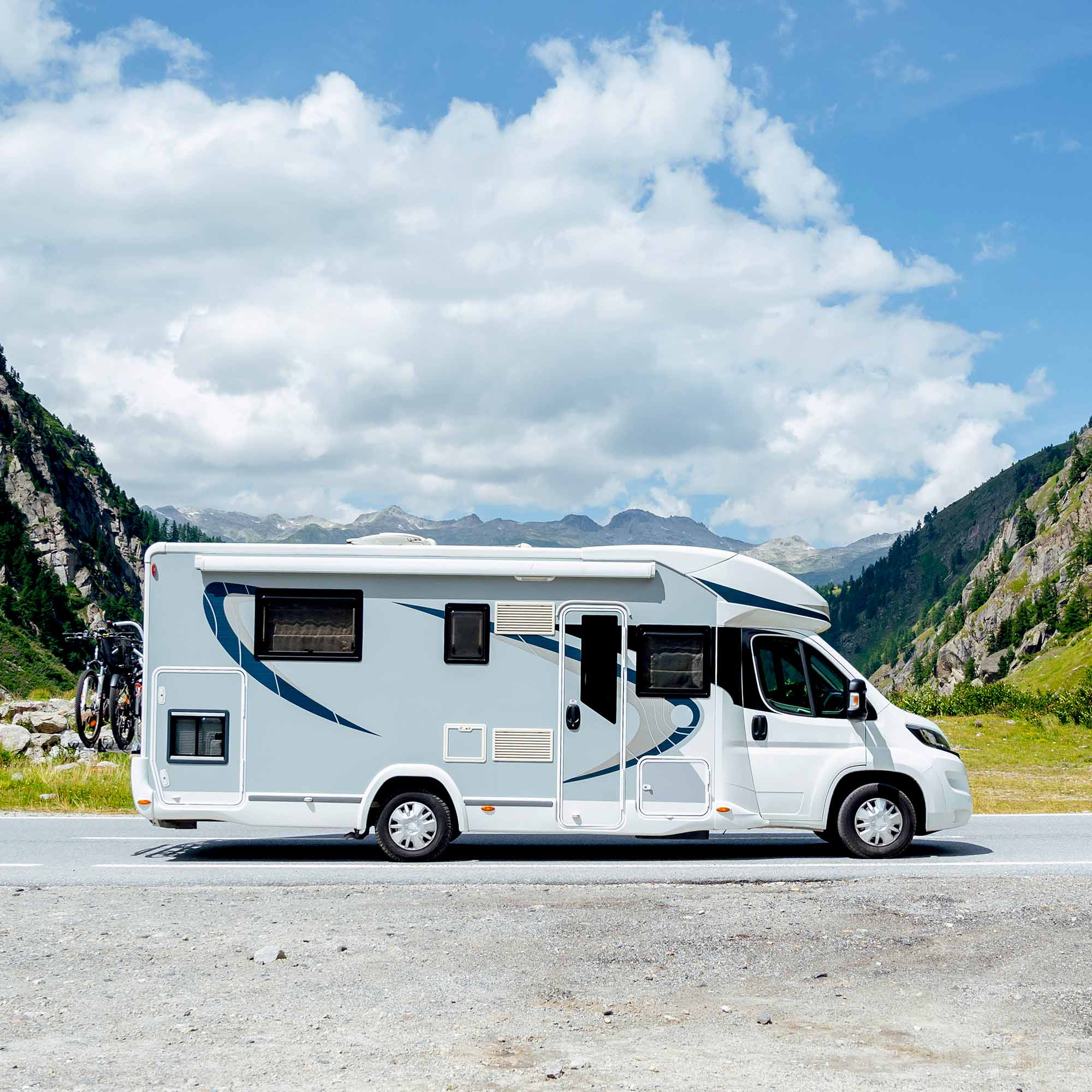 a white rv on the road