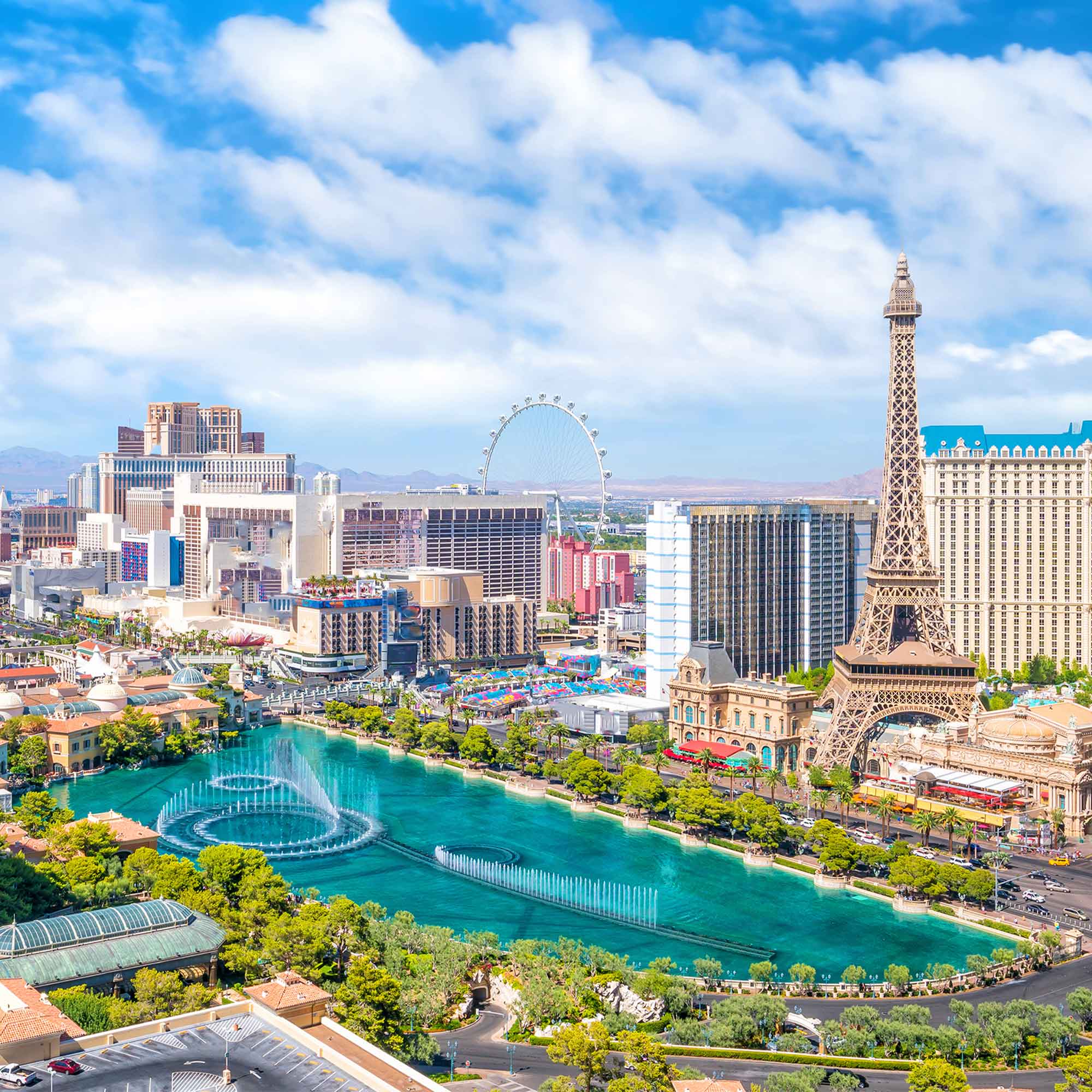 a city with a fountain and buildings