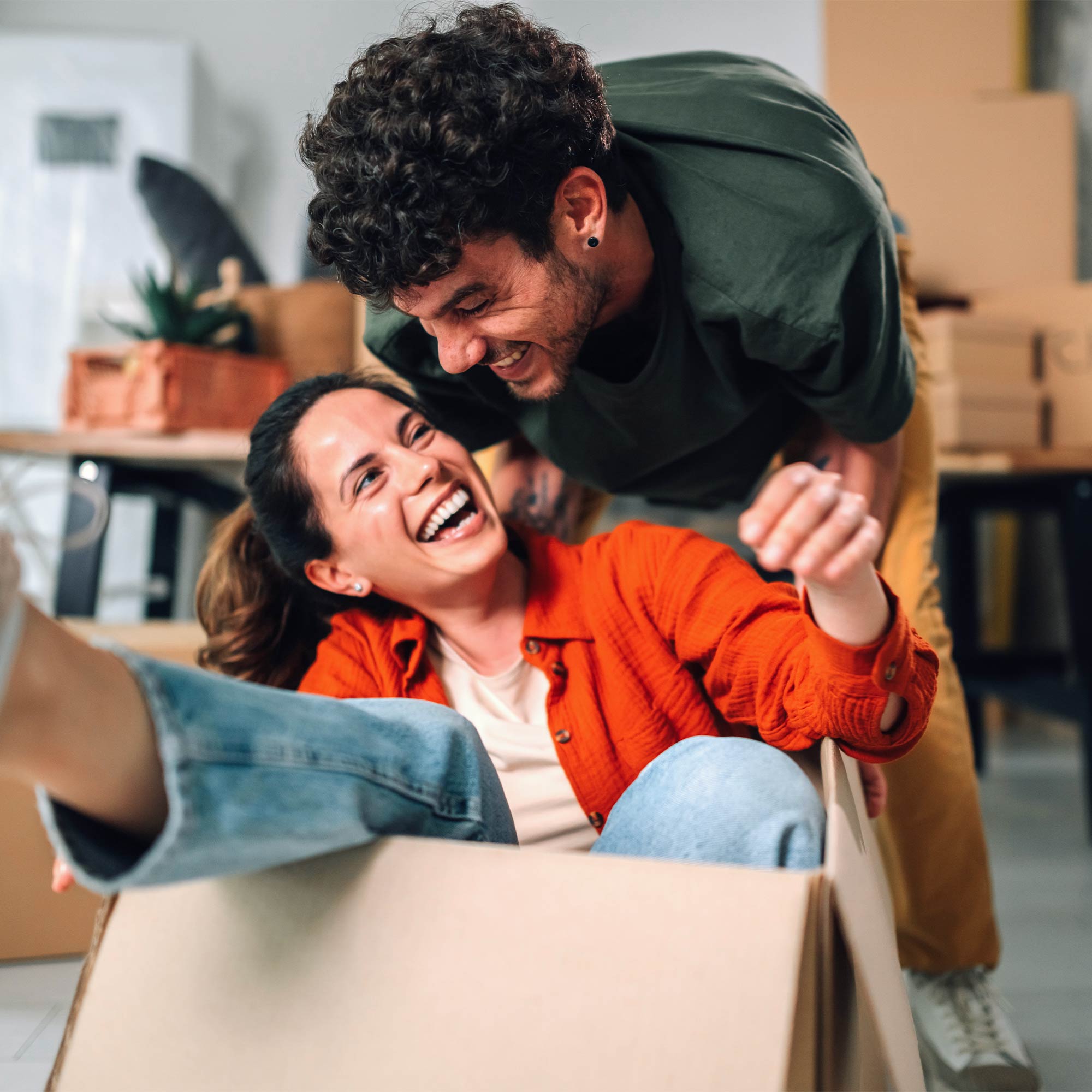 a man and woman in a box