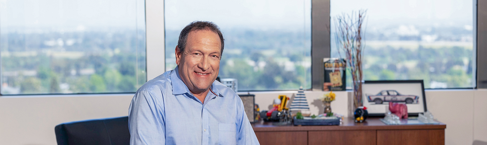 a man smiling at camera