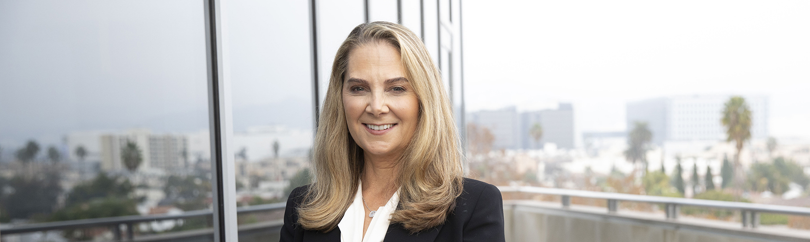 a woman smiling at camera