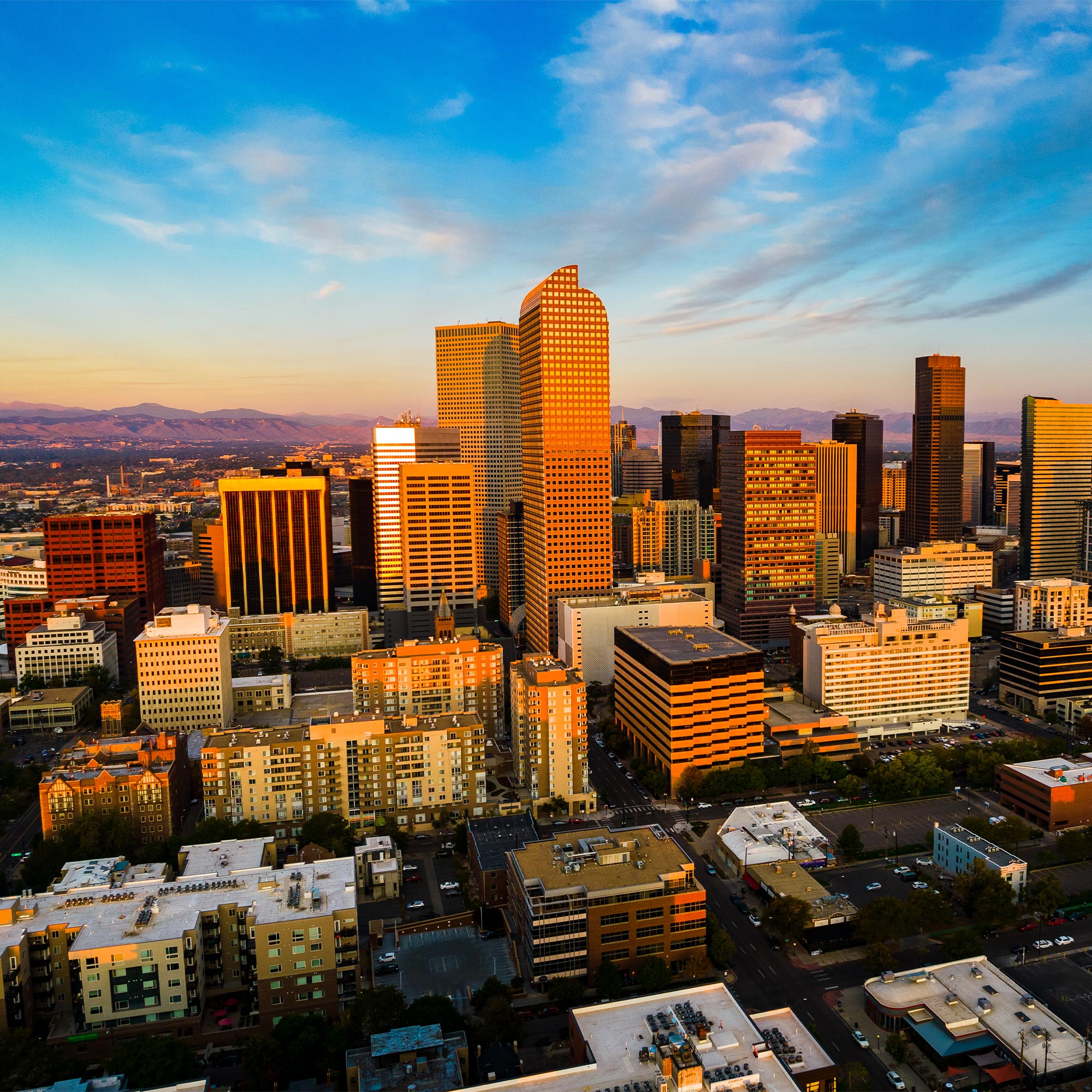 a city skyline with many tall buildings