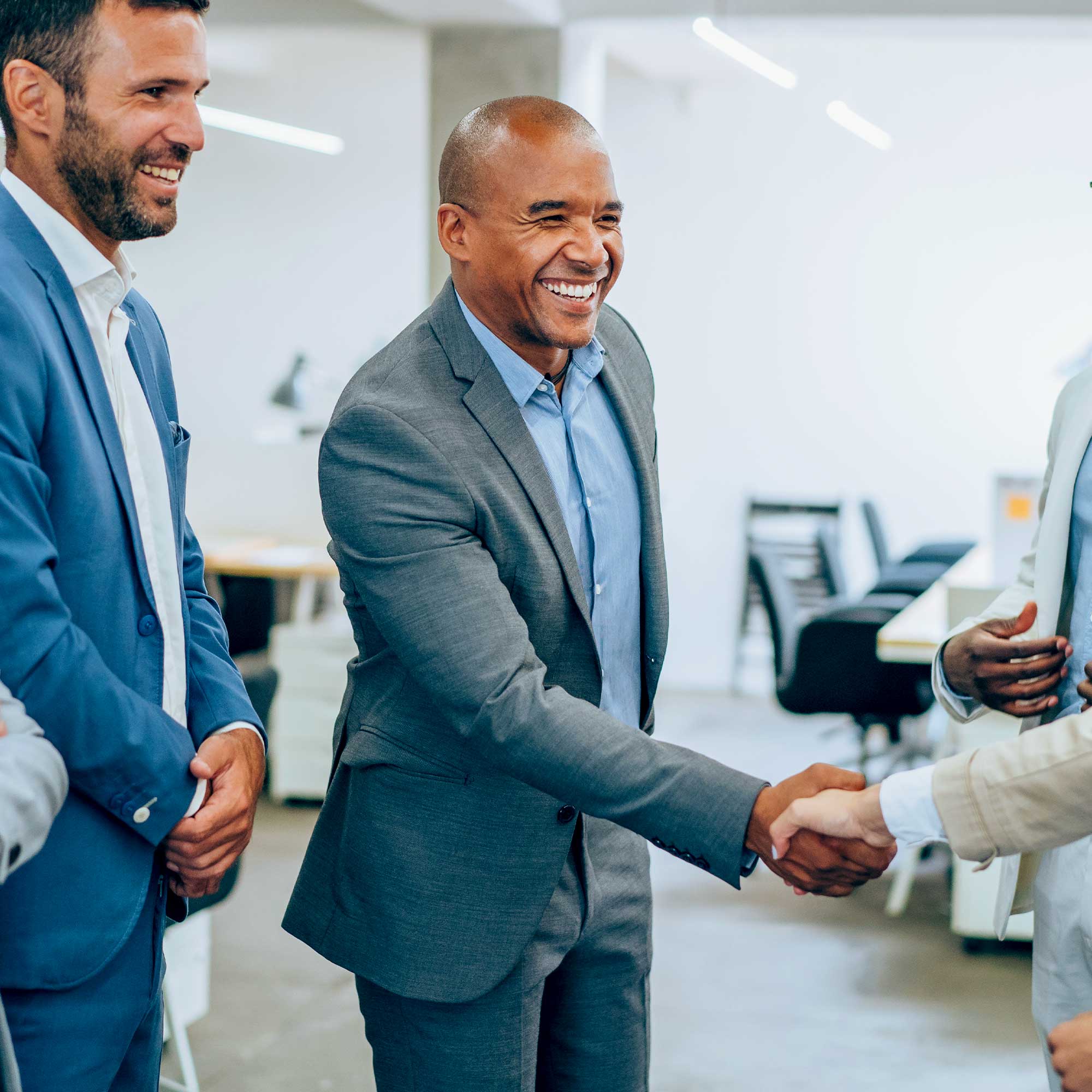 a group of people shaking hands