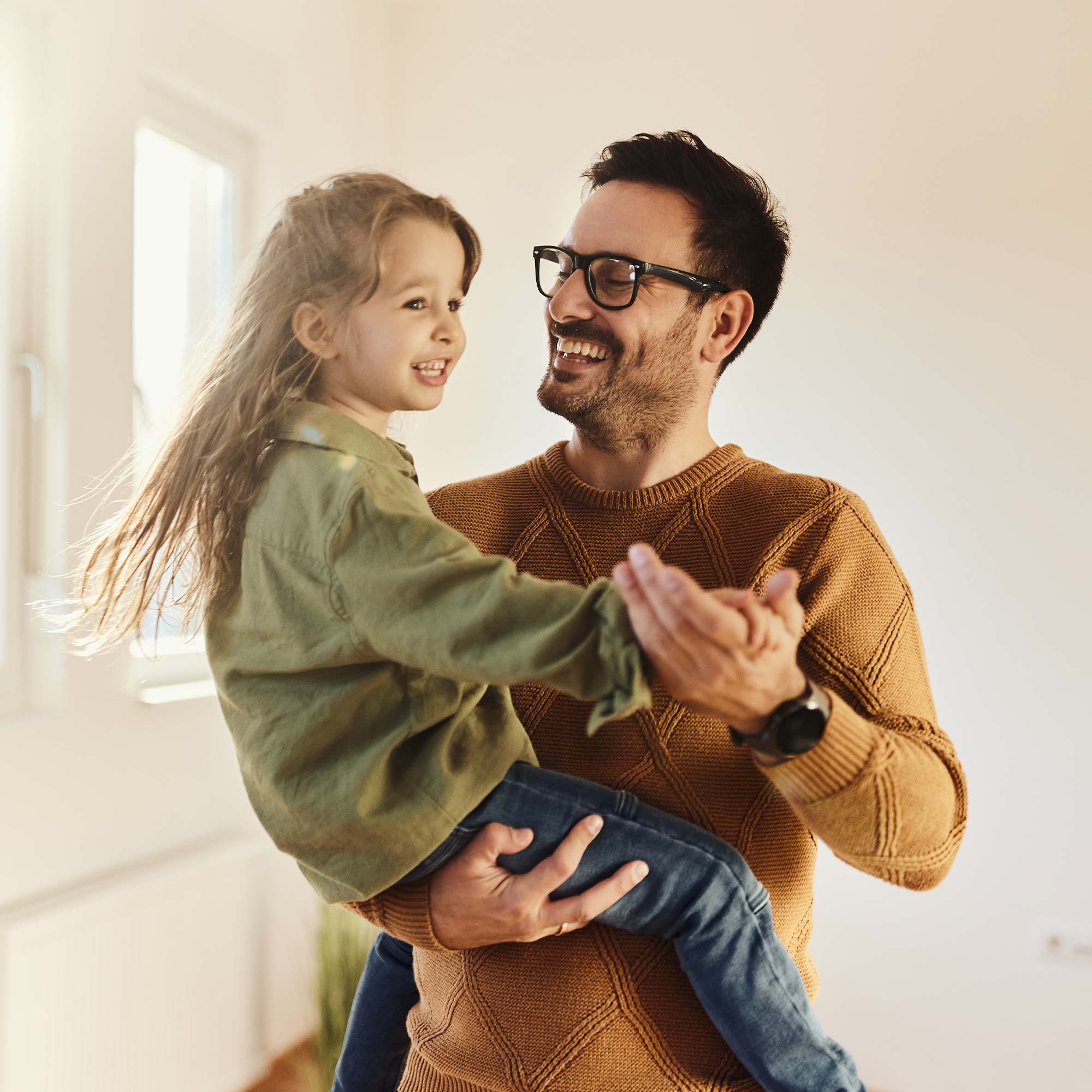 a man holding a child