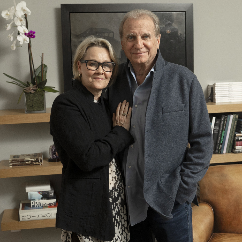 a man and woman posing for a picture