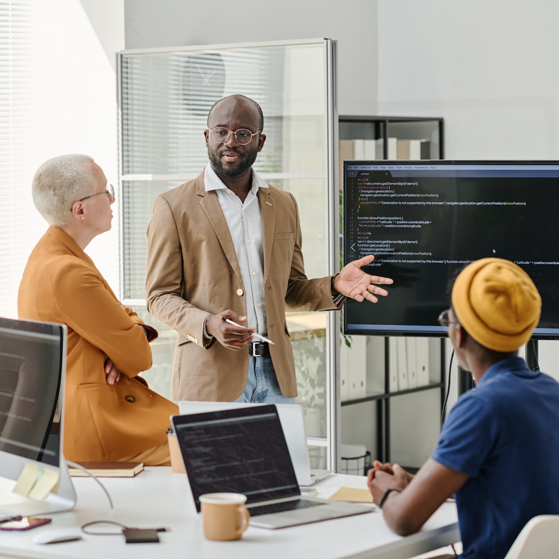 a group of people in an office