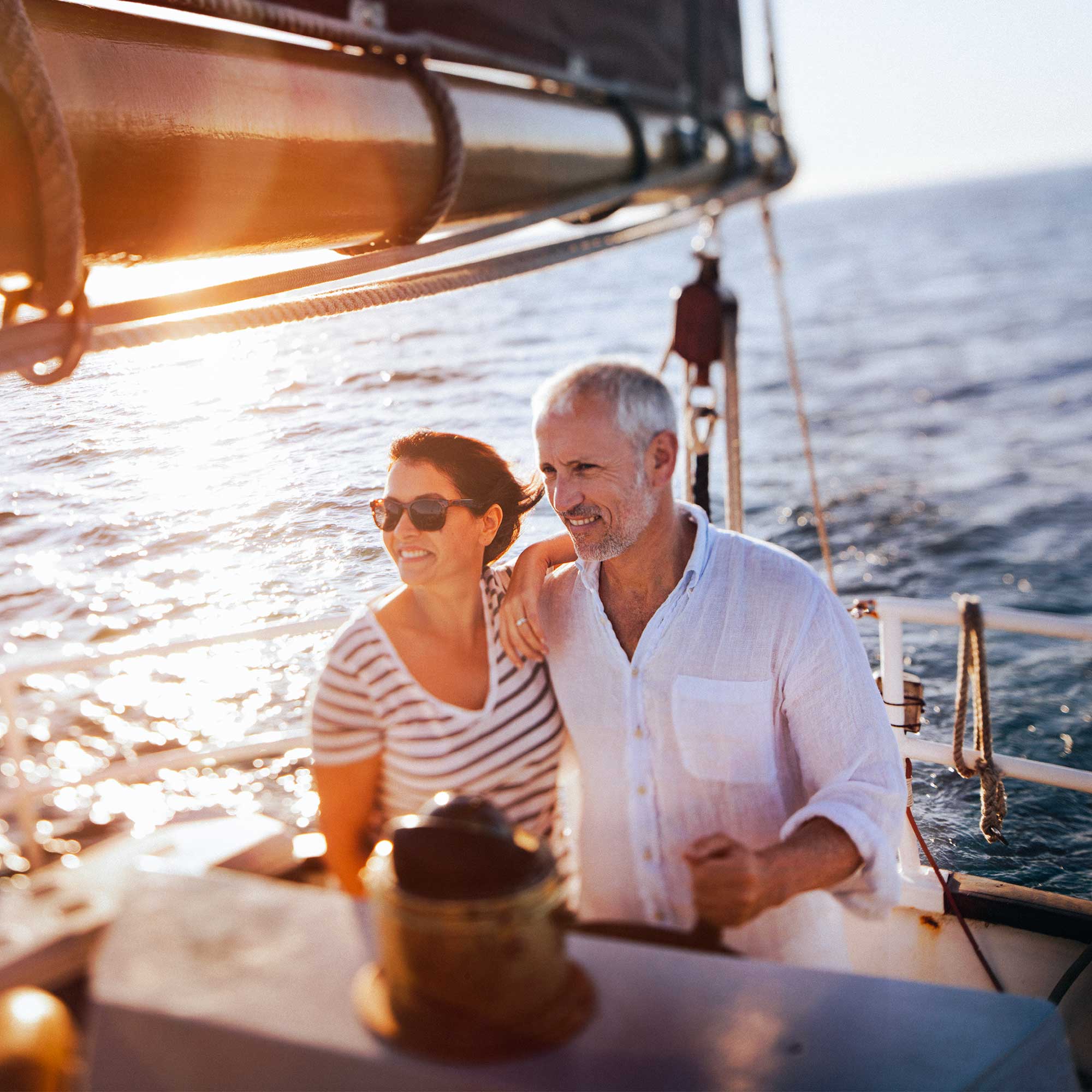 a man and woman on a boat