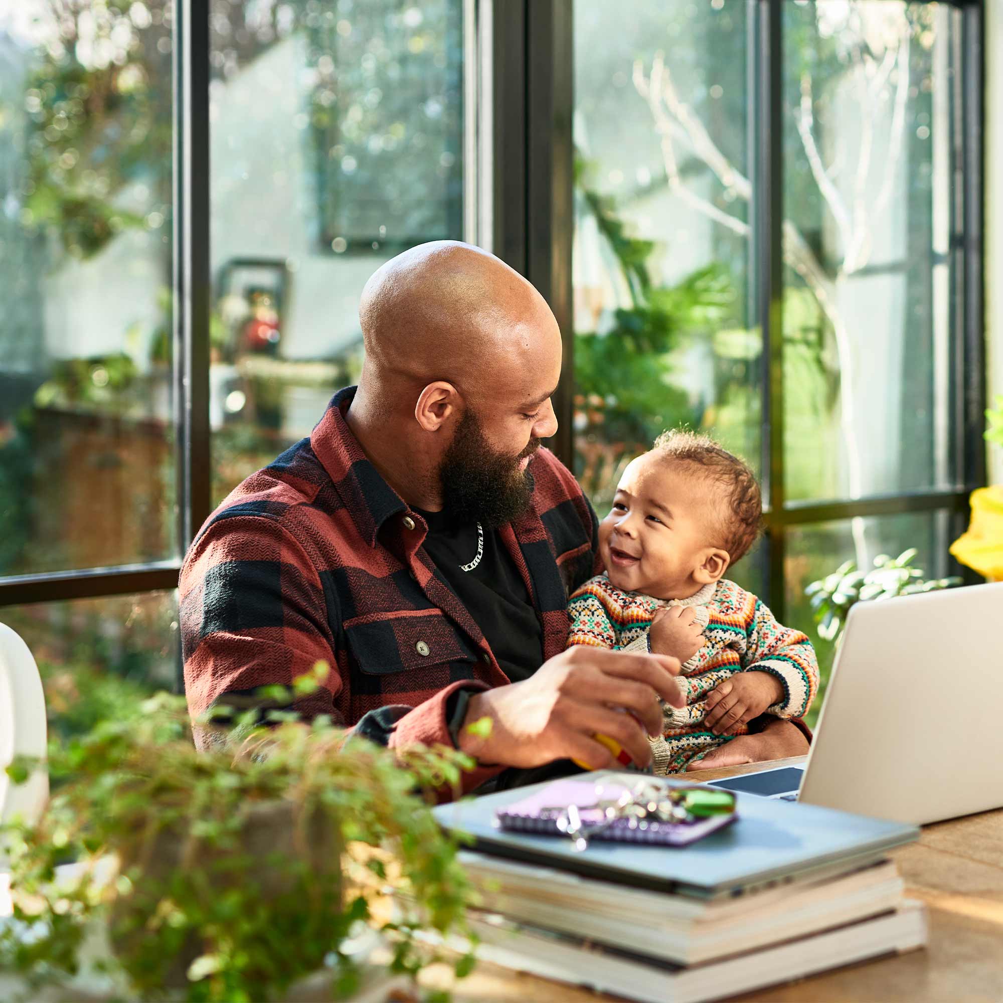 a man holding a baby