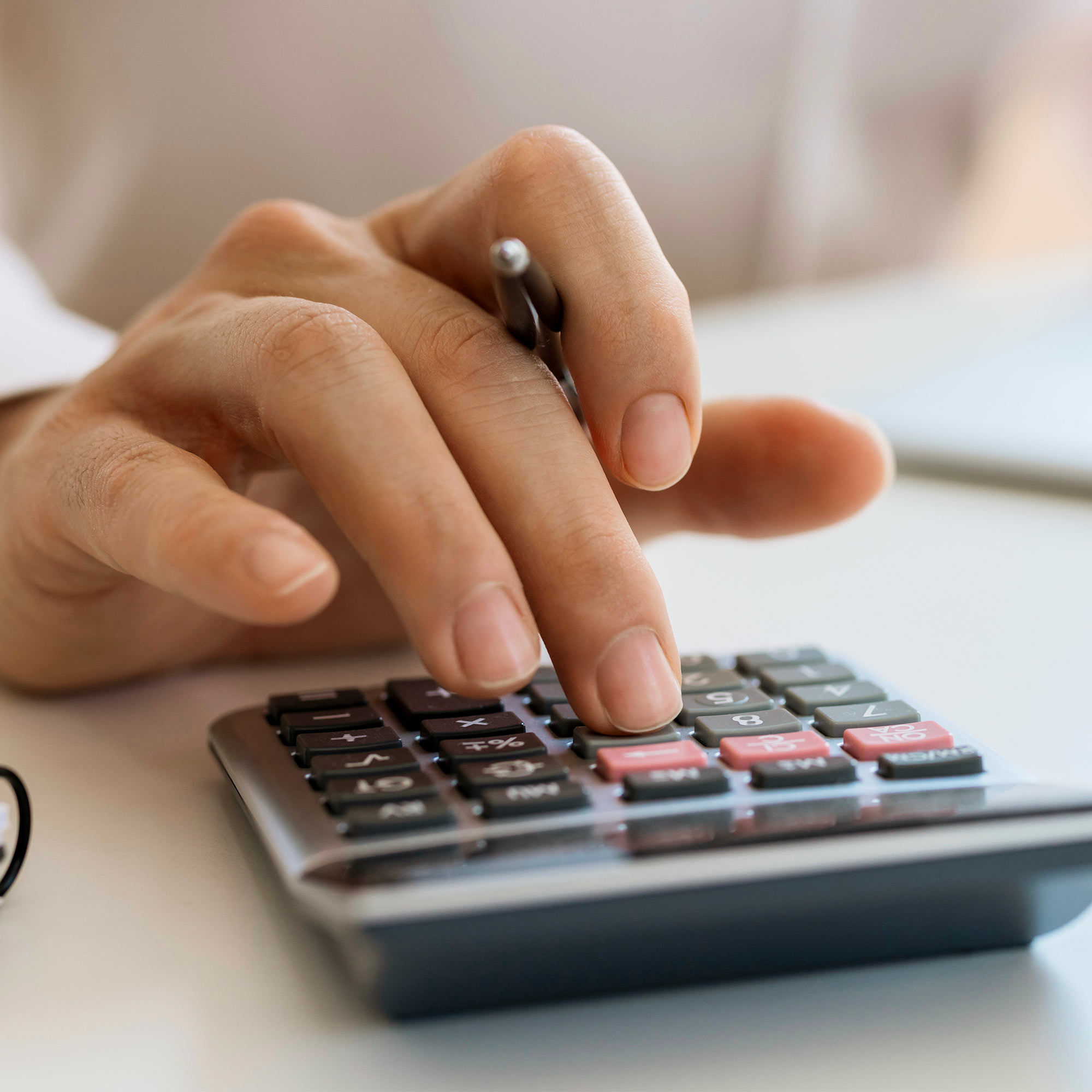 a person using a calculator
