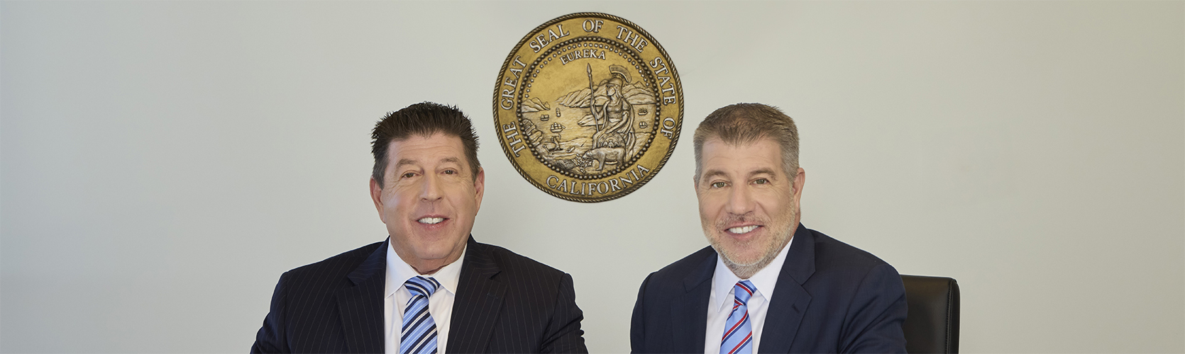 two men in suits and ties