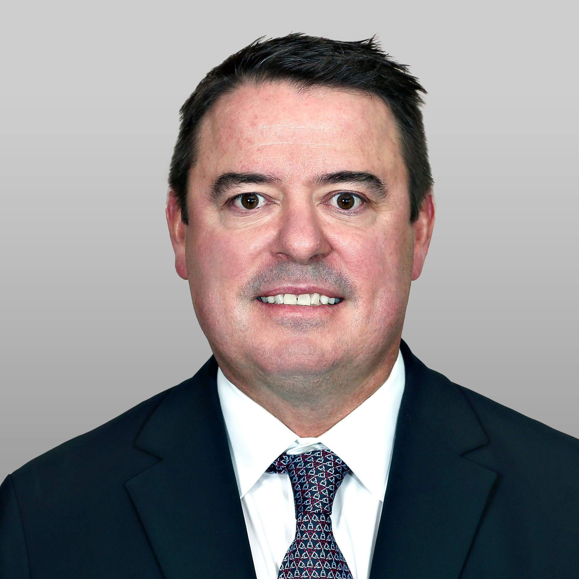 a man in a suit and tie