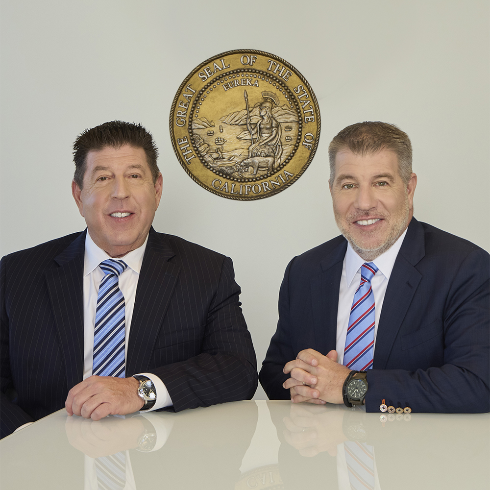 two men sitting at a table