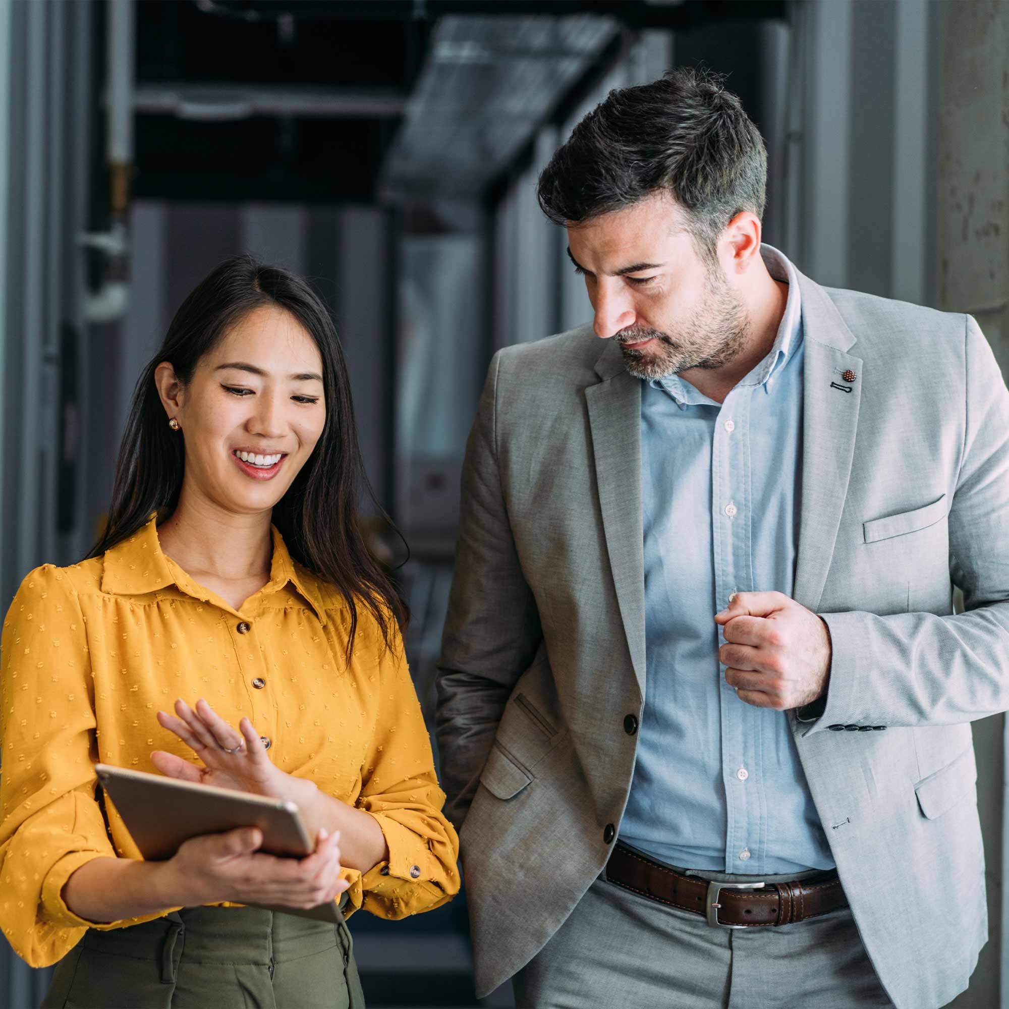 a man and woman standing 