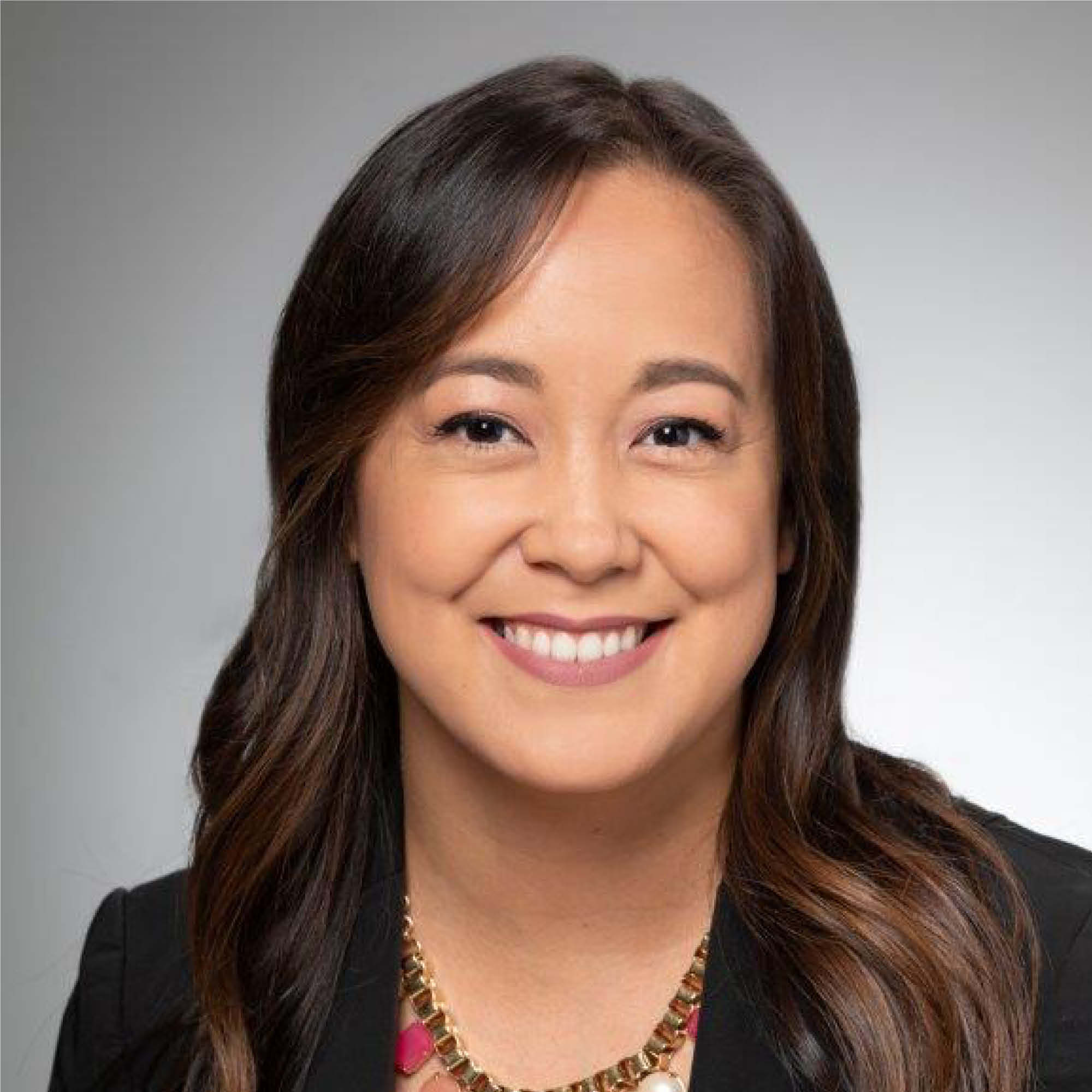 a woman smiling for a picture